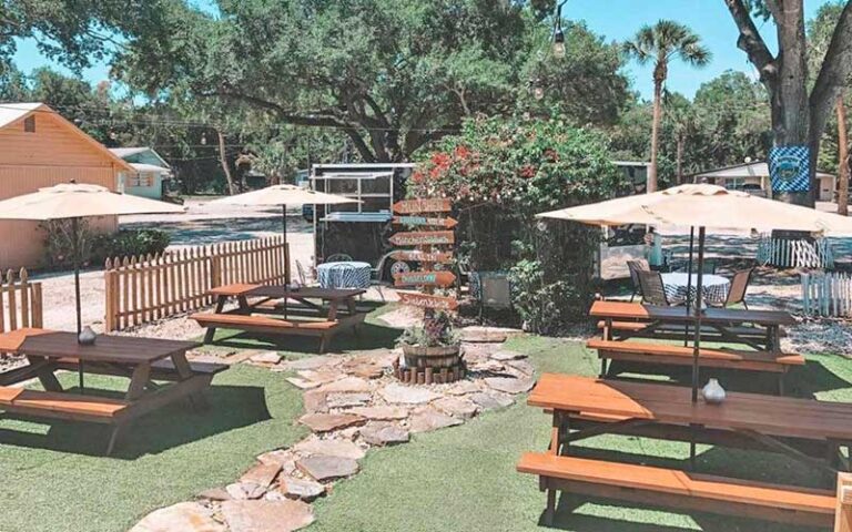 beer garden outdoor dining area with picnic tables at siegfrieds restaurant sarasota