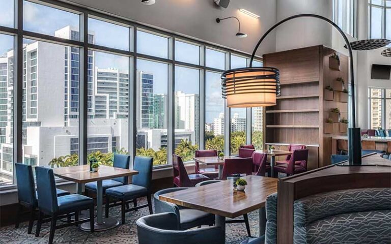 chic dining room with view at embassy suites by hilton sarasota