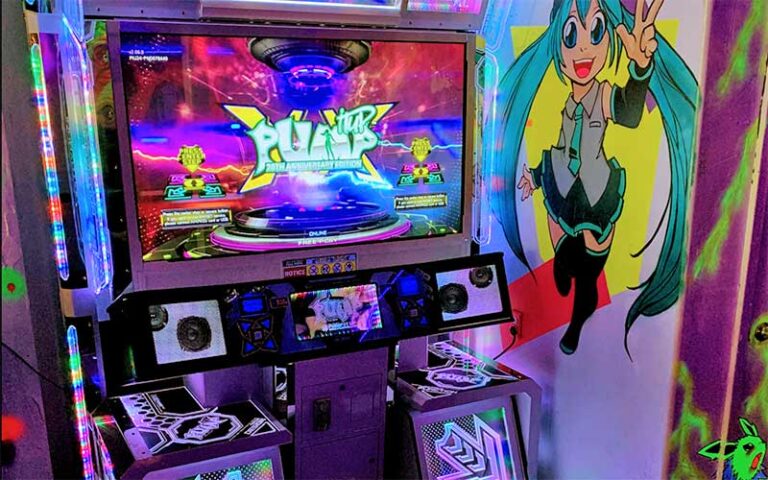 colorful arcade dance game with mural at arcade monsters lido beach sarasota