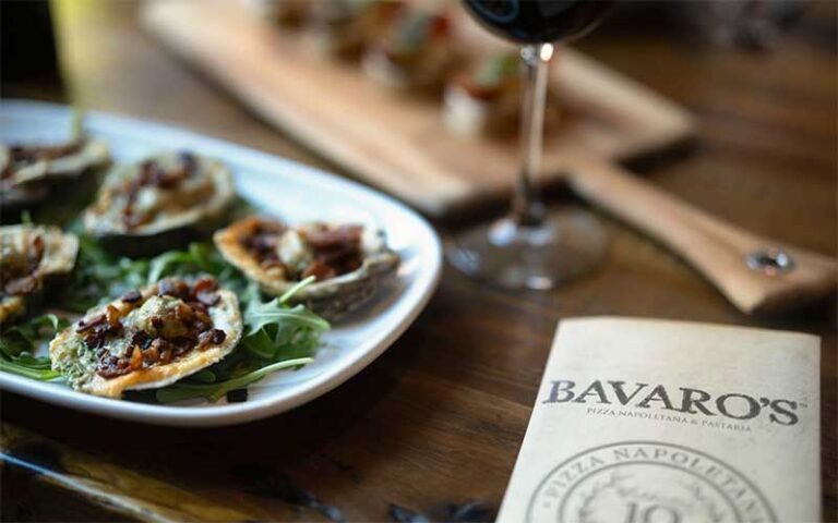 entree with wine and menu at bavaros pizza sarasota