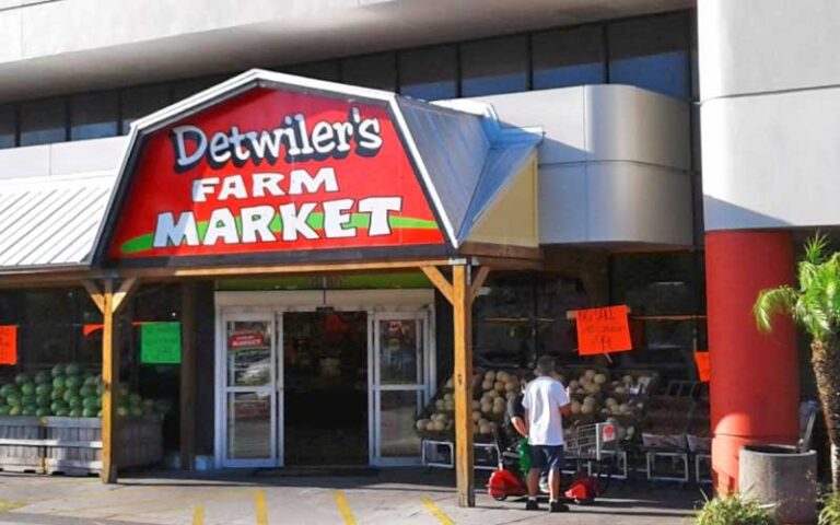 front exterior of grocery store with barn style sign at detwilers farm market sarasota