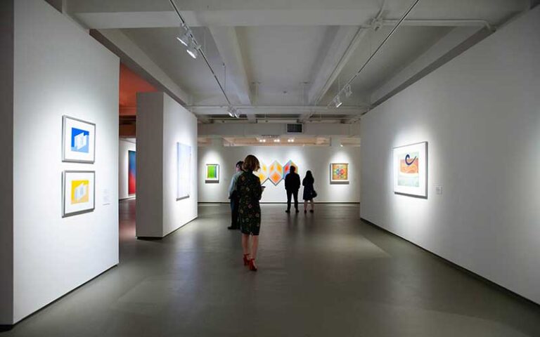 halls of wall exhibits with patrons at moca museum of contemporary art jacksonville