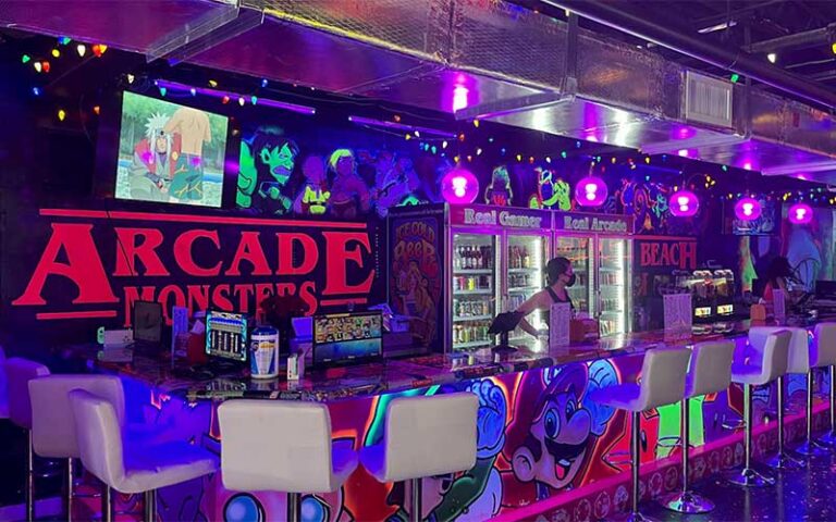 long bar with anime decor sign and tender at arcade monsters lido beach sarasota