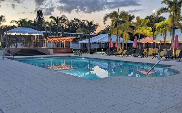 pool area with sunset at golden host resort sarasota