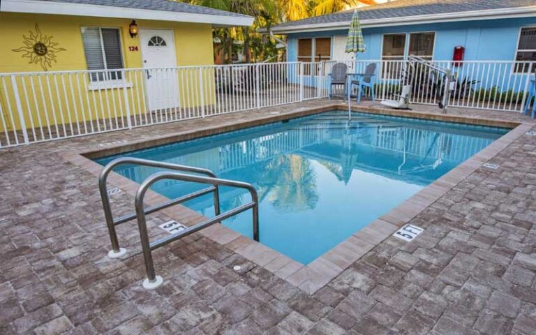 pool with blue and yellow villas at siesta key beachside villas sarasota