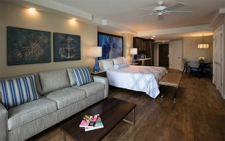 suite with bed and sofa at lido beach resort sarasota