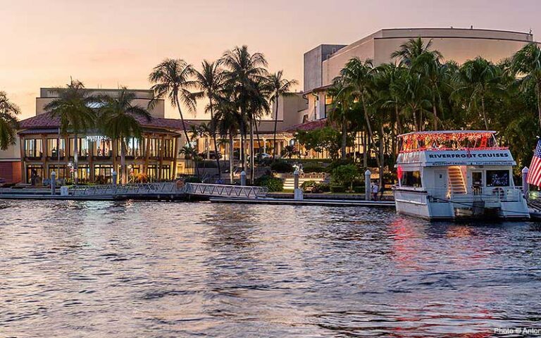 view of theater at dusk from river with boat at broward center for the performing arts ft lauderdale