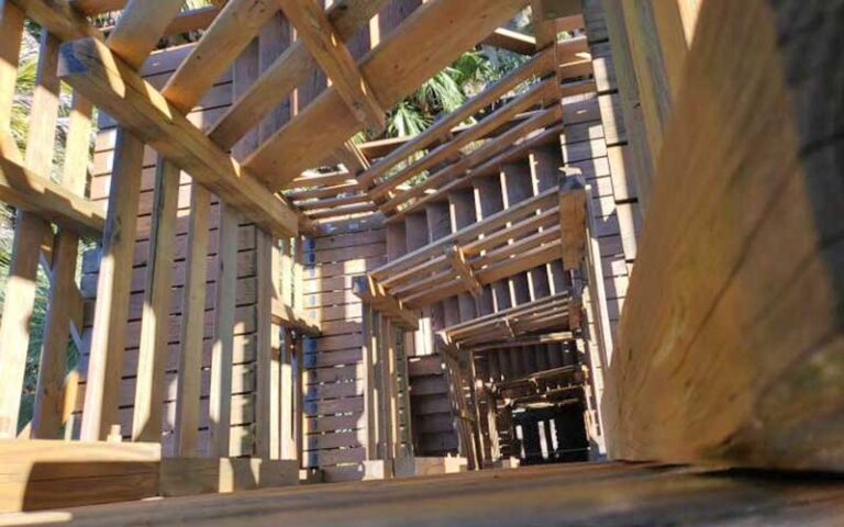 view down middle of wooden stairwell tower at myakka canopy walkway sarasota