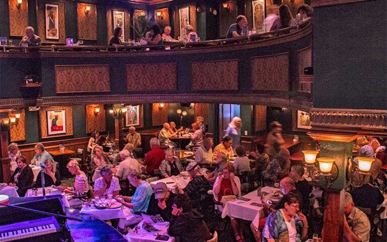 view of table seating and balcony theater area at florida studio theatre sarasota