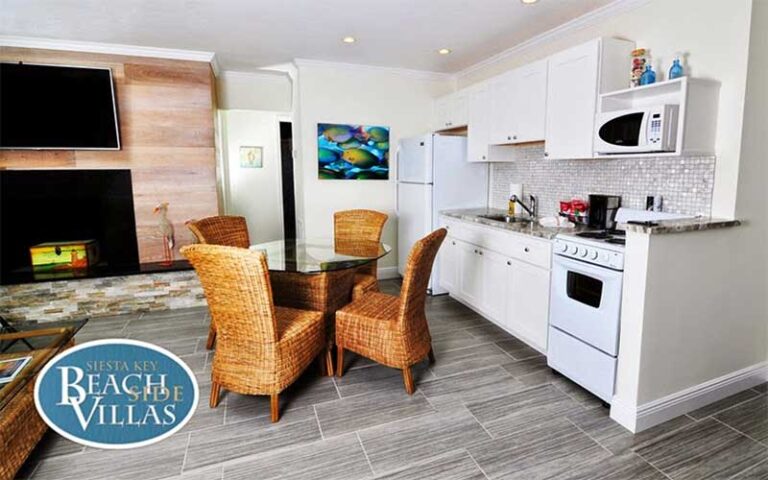 villa interior with kitchen and dining table at siesta key beachside villas sarasota