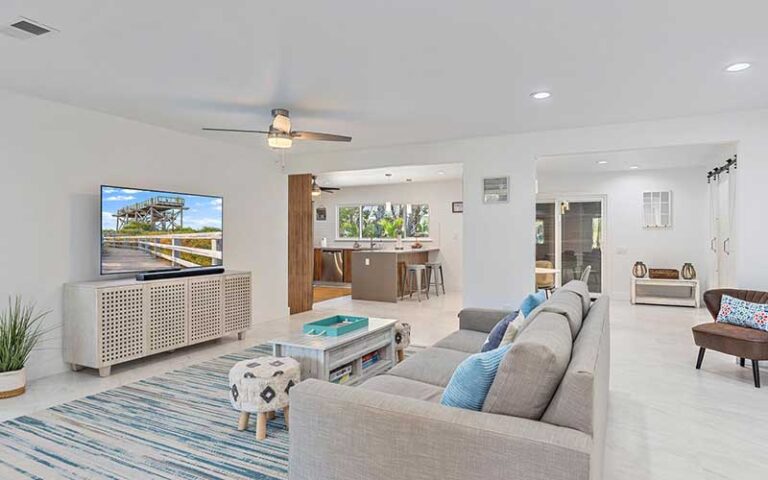 white clean design living area with windows at skyrun sarasota vacation rentals