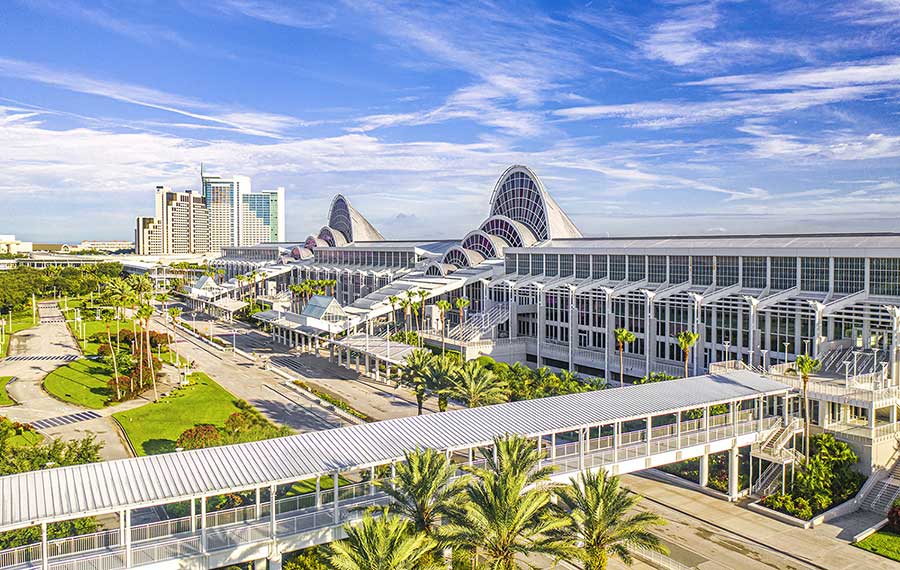 aerial side view of orange county convention center with hotel on horizon