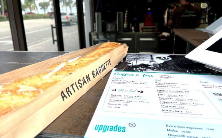 bistro counter with artisan baguette and menu at nanou sunrise blvd ft lauderdale