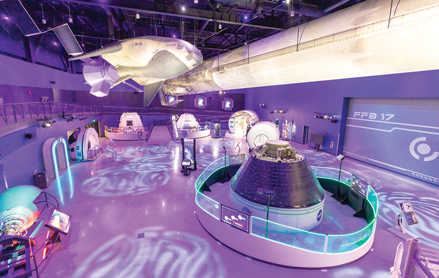 purple futuristic play area exhibit at gateway deep space launch at kennedy space center visitor complex