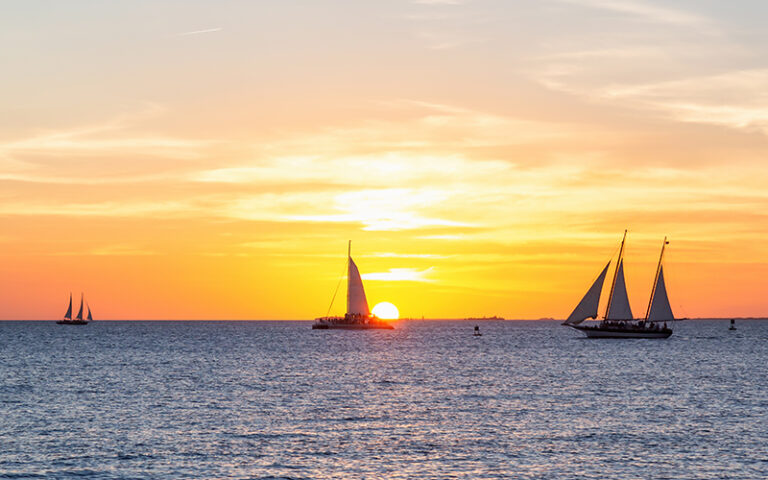 gorgeous sunset with sailboats at mallory square key west