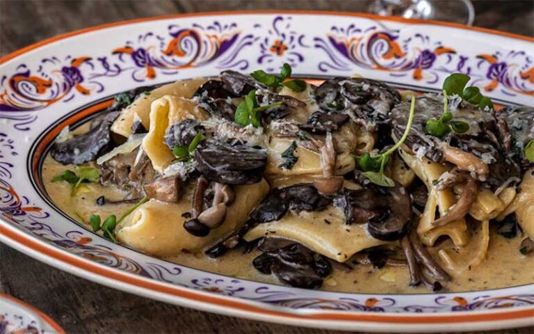 mussels pasta dish on ornate plates at louis bossi ristorante bar pizzeria ft lauderdale