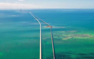 aerial view of seven mile bridge with pigeon cay and old bridge florida keys