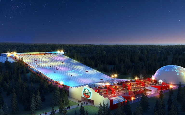 aerial view of snow tubing hill and dome theme park at night at snowcat ridge dade city