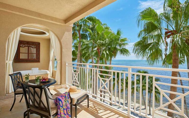 balcony with chair and view at cheeca lodge spa islamorada