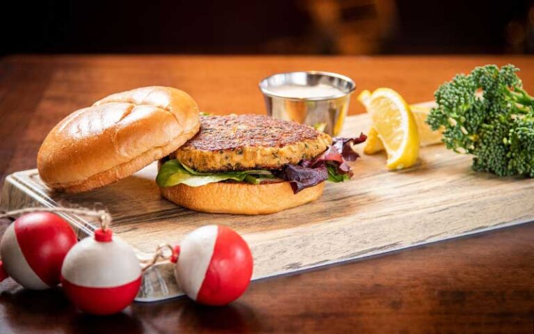 crab cake burger with fishing gear at islamorada fish company fl keys