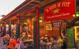 crowded patio seating outside restaurant at el meson de pepe key west