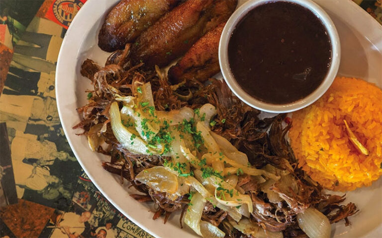 cuban cuisine dish with pork rice beans at el meson de pepe key west