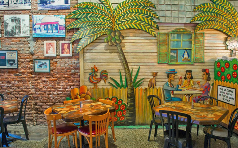 dining area with cuban decor at el meson de pepe key west
