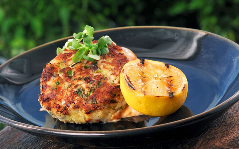 dish with crab cake and lemon at hot tin roof key west