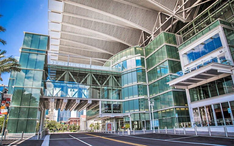 exterior view of glass multi story building with sign at dr phillips center for the performing arts orlando