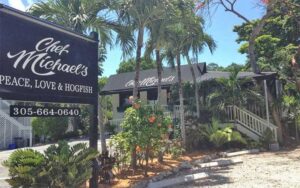 front exterior of restaurant with trees at chef michaels islamorada fl keys