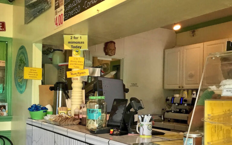 kitchen server counter with yellow and green decor at kermits key west lime shoppe