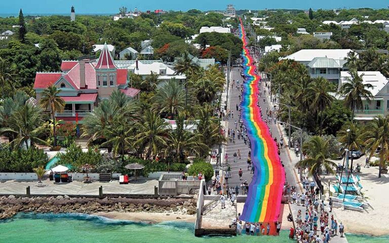 long rainbow flag along road at duval street key west