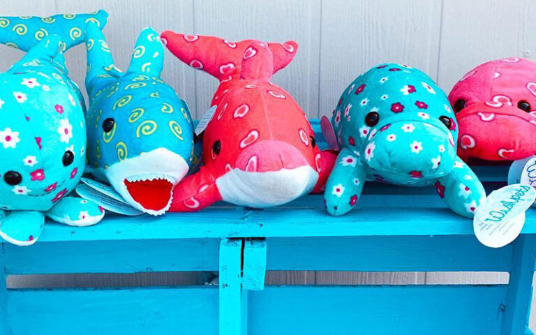 plush marine animals on shelf at largo cargo co florida keys