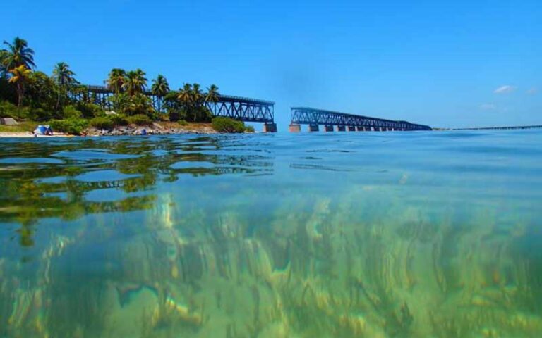 railroad bridge with clear green water below at bahia honda state park florida keys