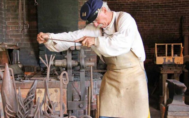 reenactment soldier working mill at fort clinch state park jacksonville