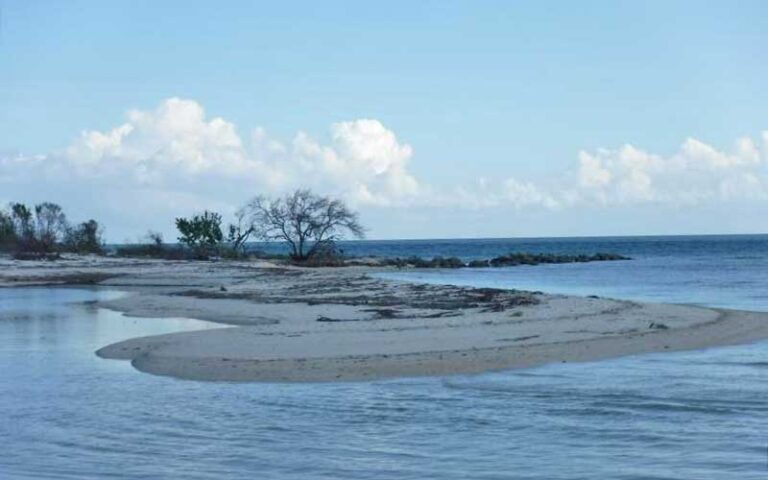 sand shoals beach area with cloudy sky at bahia honda state park florida keys