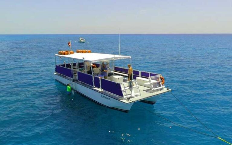 snorkeling tour boat moored on turquoise water at bahia honda state park florida keys