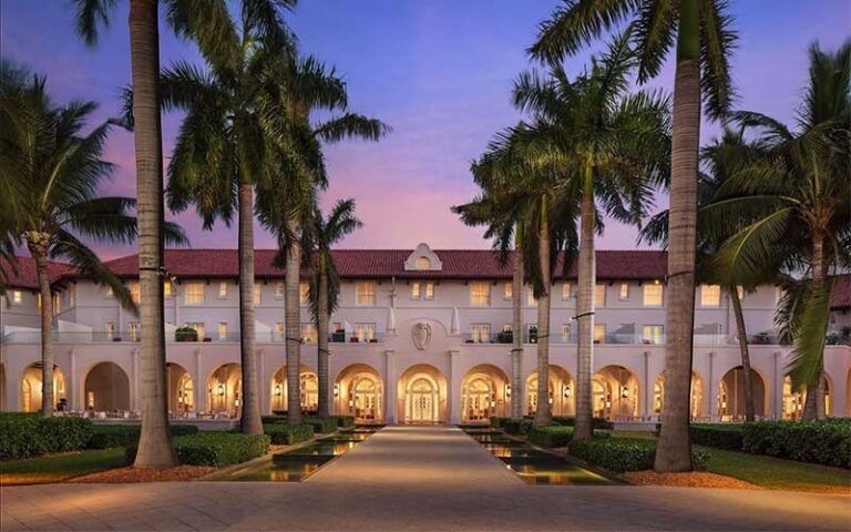 twilight view of front exterior courtyard at casa marina key west