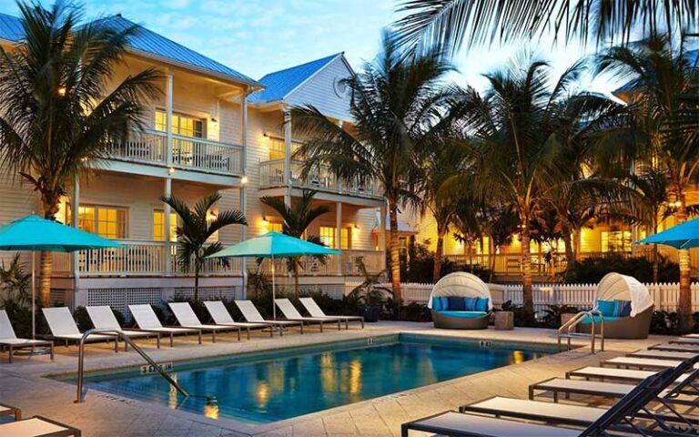 twilight view of pool area with hotel at the marker key west harbor resort