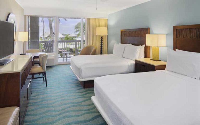 two queen bedroom with balcony at opal key resort marina key west