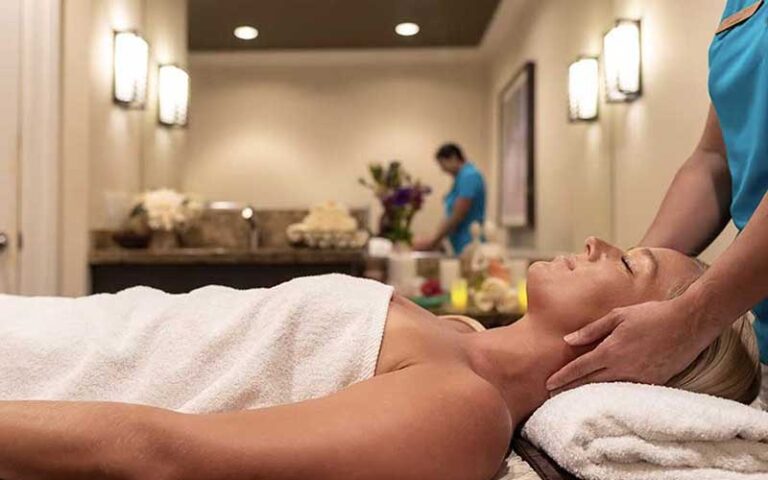 woman getting massage in spa area at pier house resort spa key west