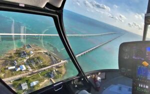 aerial view from cockpit of seven mile bridge at keys helicopter tours marathon