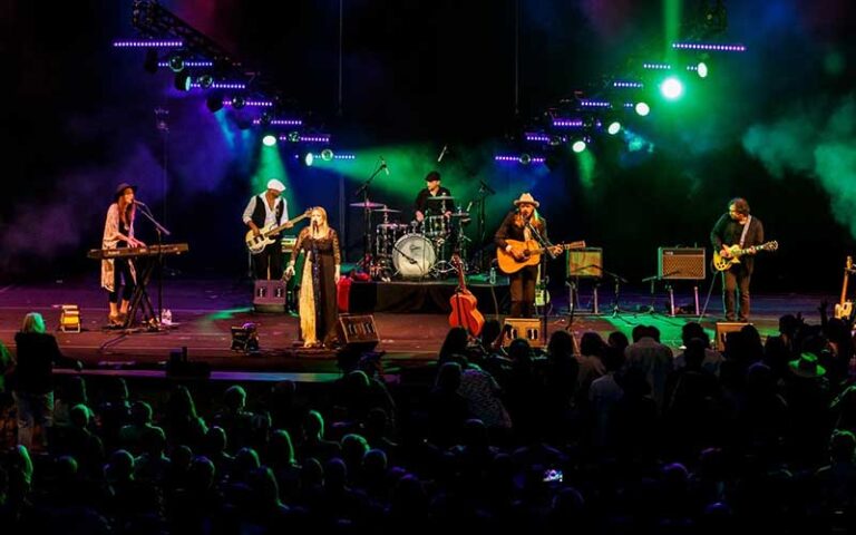 band performing on stage with colorful lighting at the parker fort lauderdale