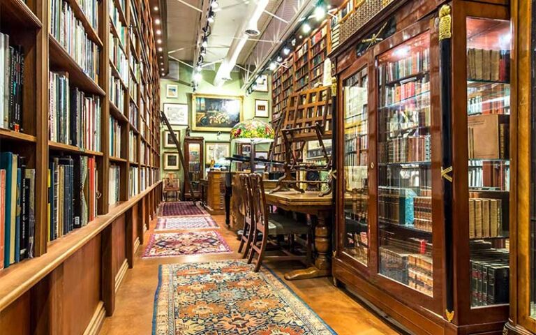 book shelves with tables and easel at old florida book shop fort lauderdale