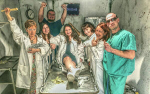 cheering group in zombie morgue escape room at fox in a box miami