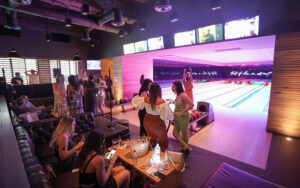 crowded lounge around bowling lanes at basement bowl and skate miami beach edition