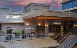 evening view of exterior of second floor theater at cinepolis coconut grove miami