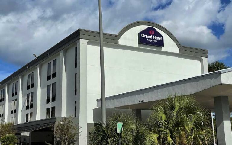 exterior of hotel with sign at grand hotel kissimmee