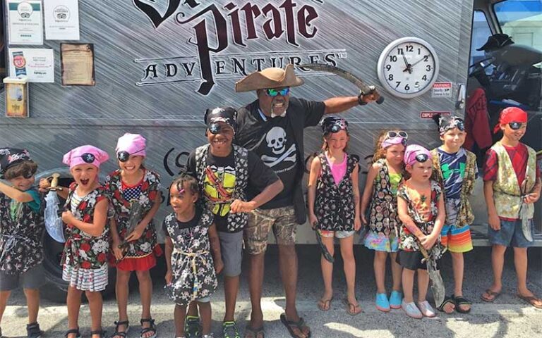 group of kids in pirate costume with captain at bluefoot pirate adventures fort lauderdale