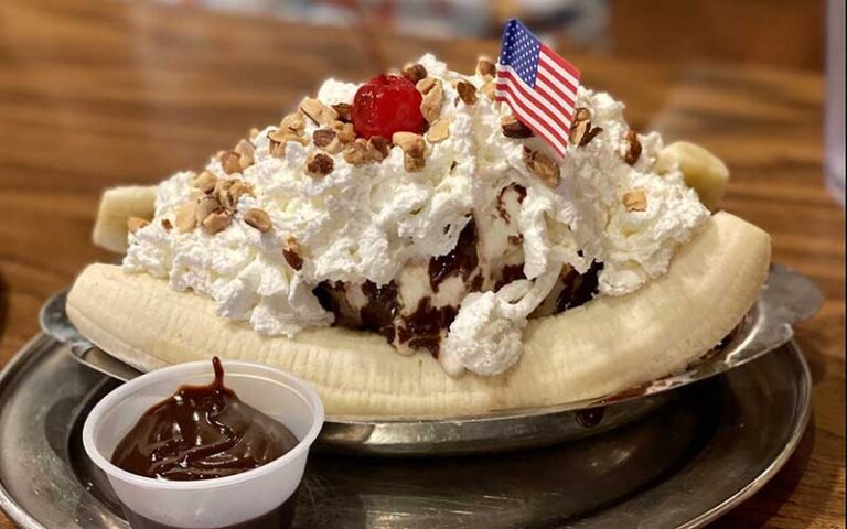 large platter banana split with flag at jaxsons ice cream parlor fort lauderdale